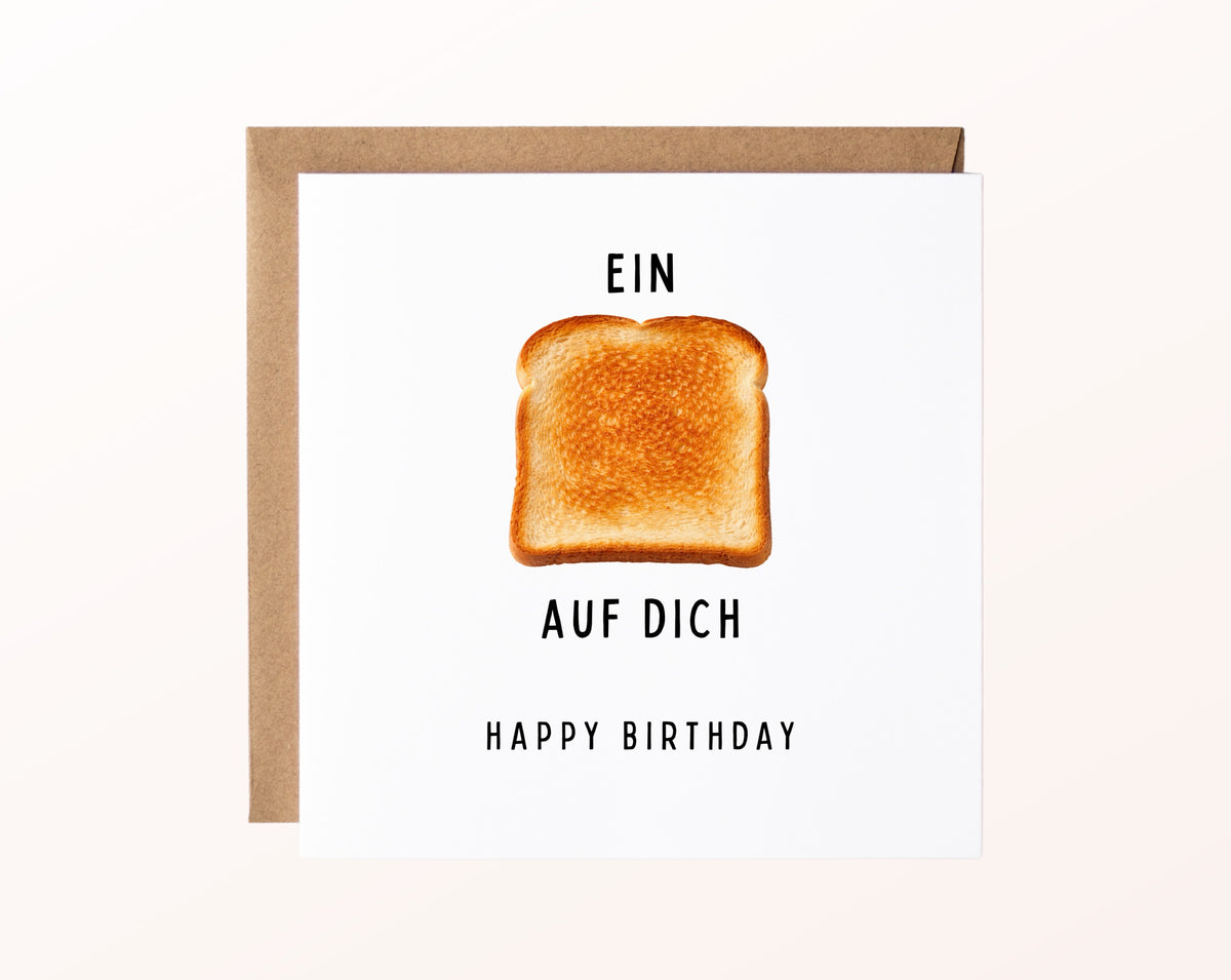 Geburtstagskarte „Ein Toast auf Dich“ mit fotorealistischem Toastmotiv und Kraftpapierumschlag