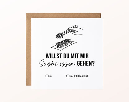 Gutscheinkarte „Sushi essen – Stäbchen“ mit Sushi und Stäbchen und Kraftpapierumschlag