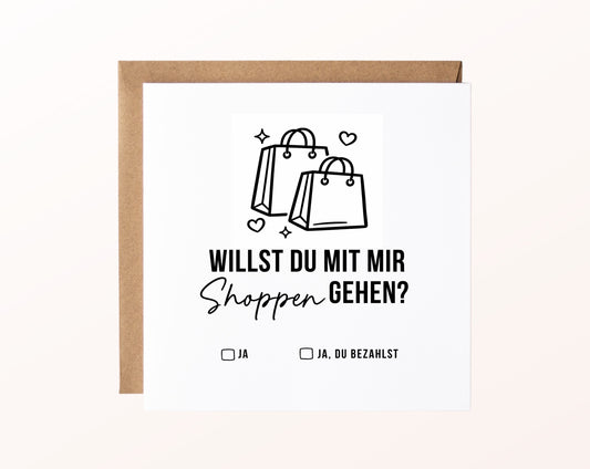 Gutscheinkarte „Shoppen gehen“ mit Einkaufstaschen und Kraftpapierumschlag